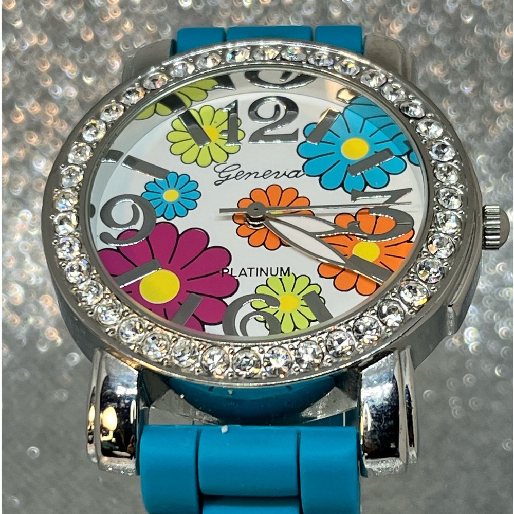GENEVA! This is one of my favorites! Fun, funky flowers, and 42MM! Big n bold!